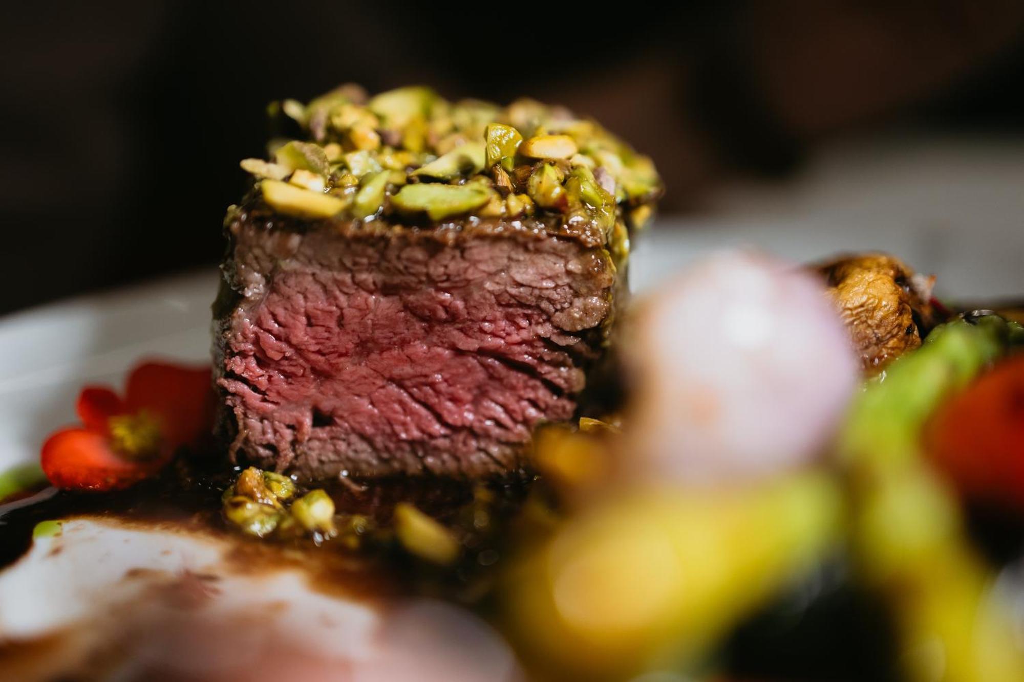 Hotel Platinia Cluj-Napoca Exterior photo A pistachio crusted steak