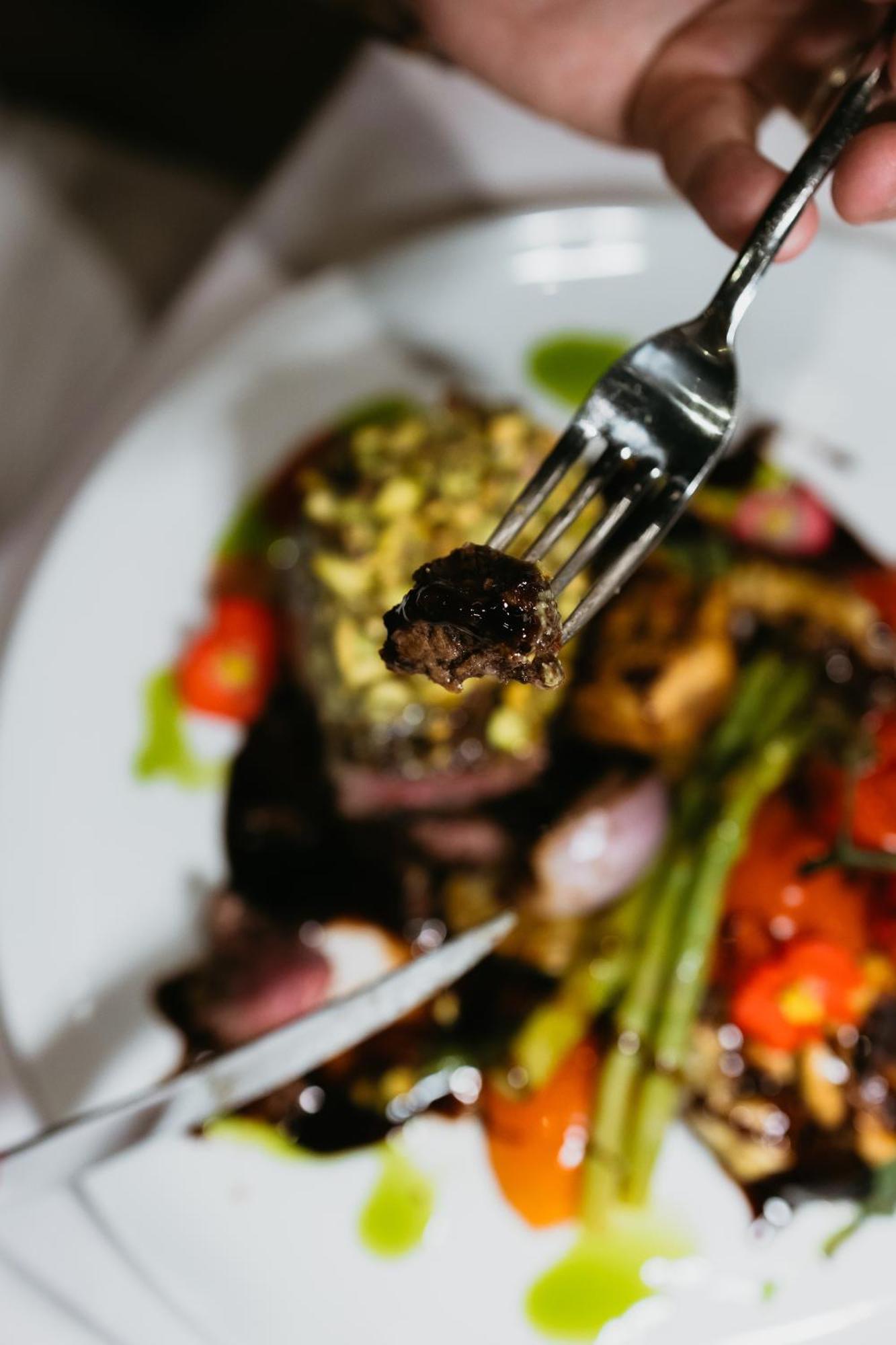Hotel Platinia Cluj-Napoca Exterior photo A piece of falafel on a fork