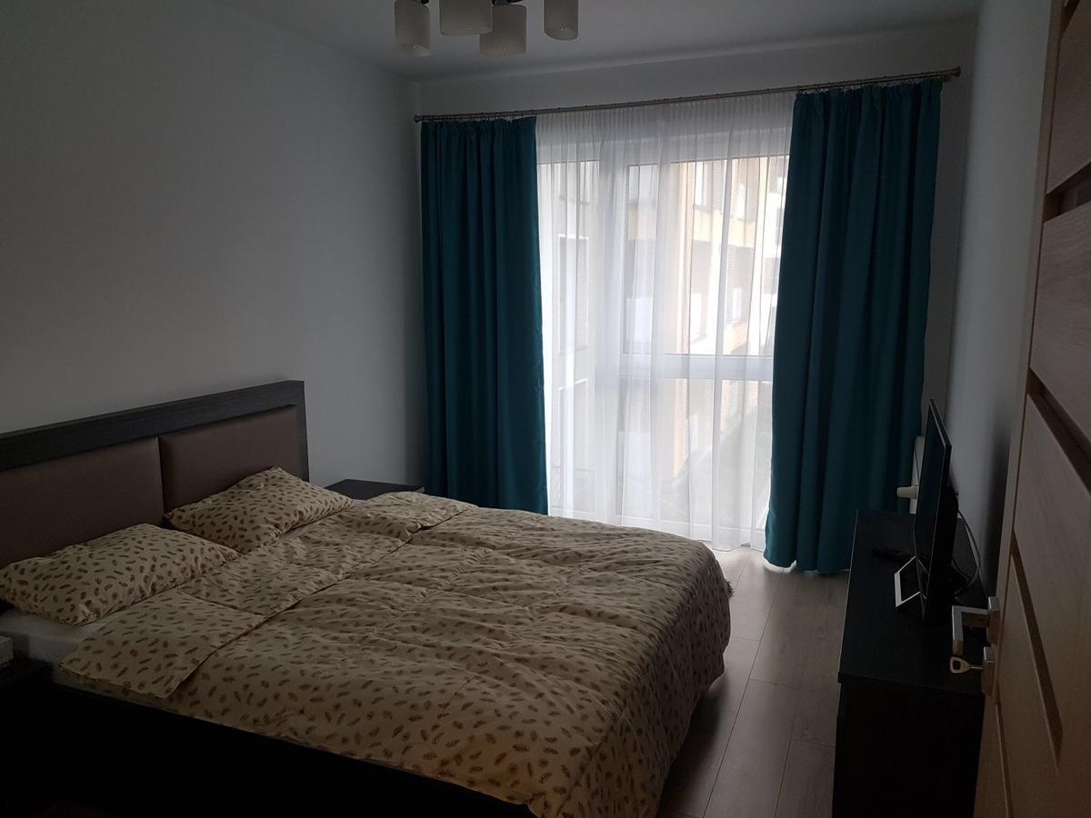 Hotel Platinia Cluj-Napoca Exterior photo A bedroom in a typical apartment